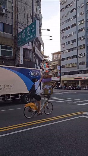 1.9K views · 321 reactions | A man in Taiwan runs a red light and rides in the opposite lane all while carrying a huge stack of boxes. It’s a miracle he didn’t cause an accident. | Foreigners in Taiwan 外國人在台灣 | Facebook
