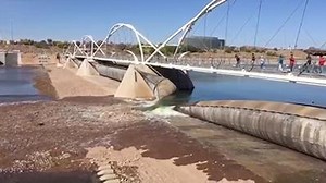 We are releasing the last of the water from Tempe Town Lake. Please stay out of the riverbed for your own safety. Since water is precious to us, we pumped nearly 400 million gallons into the Salt River Project canal system for irrigation uses. This water will rejuvenate our downstream habitat. As soon as it is possible, construction crews will begin removing the original dam system. Town Lake is expected to reopen around April 30. Thank you for your patience. Get more information at www.tempe.go