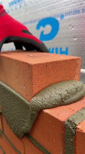 Satisfying Bricklaying with Laser Guide