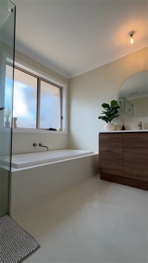 Microcement bathroom makeover This bathroom went from dated to calm, seamless, and spa-like 🤍 The microcement finish completely transformed the space without a full rip-out renovation. Clean lines, soft texture, and a whole new vibe. Would you choose microcement for your bathroom? 👀 #MicrocementBathroom #BathroomMakeover #DIYBathroom #BeforeAndAfter #ModernHome #SpaBathroom | Refinish With Jade