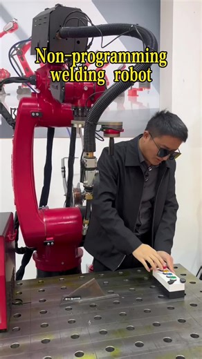 Welding Robots in Industrial Factories