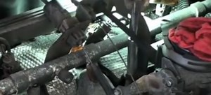 How to Repair a Ripped Throttle Cable | DoItYourself.com