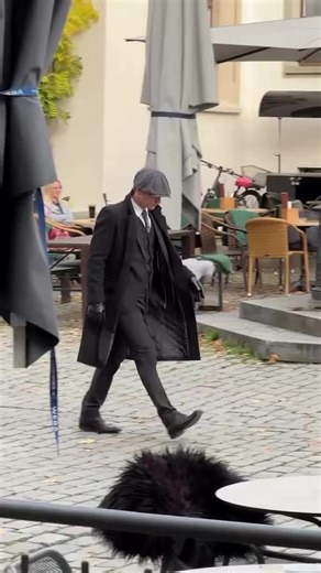 Men's Fashion: Elevate Your Style with a Dark Gray Suit and Black Trench Coat