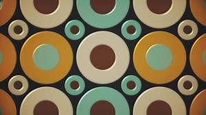 Download Trendy retro 1970s geometric pattern background with colorful blinking plastic effect circles in warm color tones. This stylish vintage motion background animation is 4K and a seamless loop. for free