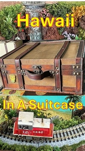 Hawaii diorama presented in an N scale mini suitcase railroad, featuring a sugarcane railroad