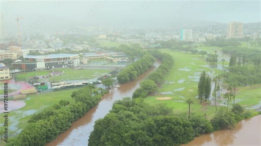 March 2026 Kona storm. Ala Wai Canal Floods after heavy rain. Waikiki, City of Honolulu, Ohau, Hawaii winter. Koʻolau Range (shield volcano). Golf Course.