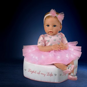 Let this lifelike Linda Murray doll brighten each day. With light-up skirt and custom ottoman! Shop Now! http://bit.ly/2PXWpUW | The Ashton-Drake Galleries