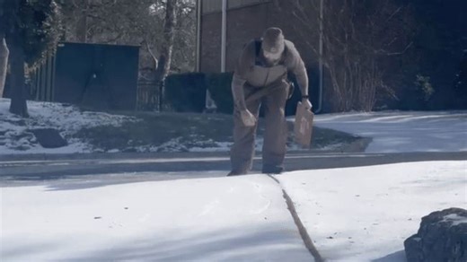Frozen driveway is no obstacle for nimble UPS guy