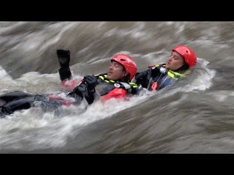 First responders work on swift water rescue techniques on Clear Creek