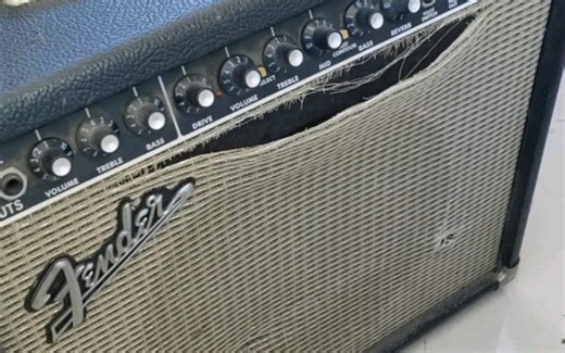 Fender芬德电吉他音箱爆音的维修和更换网罩