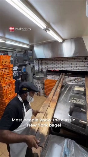 Montreal bagel at @fairmountbagel📍Montreal, Canada 🇨🇦Explore Canada: https://t.co/cugytZY1JqThe Montreal bagel is a dense, imperfect ring of dough. Eastern European Jewish immigrants brought the recipe to Canada in the early 1900s, and the bakeries that opened back then still use the exact same manual method today. The dough is rolled by hand into an uneven circle with a wide hole, leaving no room for a thick, fluffy center.Bakers drop the raw dough into a rolling boil of honey-sweetened wate