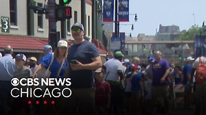 Cubs fans try to stay cool at Wrigley Field