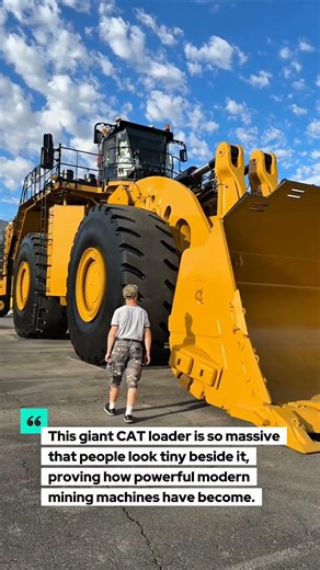 Giant CAT Loader Looks Tiny Humans Because Massive Machine Dominates #CAT #HeavyEquipment #Mining