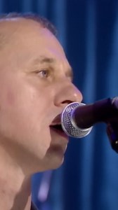 Watch: Mark and band performing 'Je Suis Désolé' live as part of his A Night In London concert at the BBC in April 1996. Experience the complete performance on YouTube: https://youtu.be/4GMpjVCG-tQ | Mark Knopfler