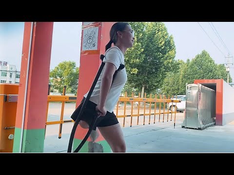 RAK amputee one leg girl crutching to work