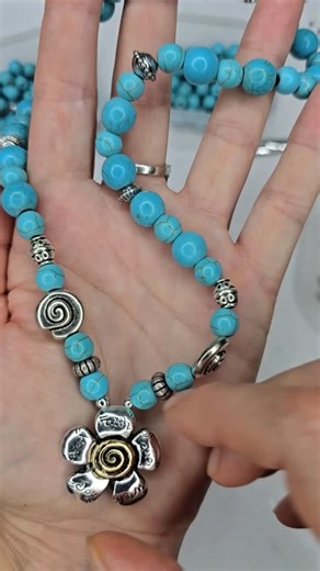 Easy beading tutorial to demonstrate how to use a two-hole slider bead as a pendant in a necklace design. This shows how a two-hole slider bead does not have to always be a double strand jewelry design. #necklacetutorial #jewelrymaking #beading | Mobile Boutique