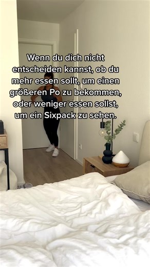 Post-Workout Stretching Routine in a Minimalist Bedroom