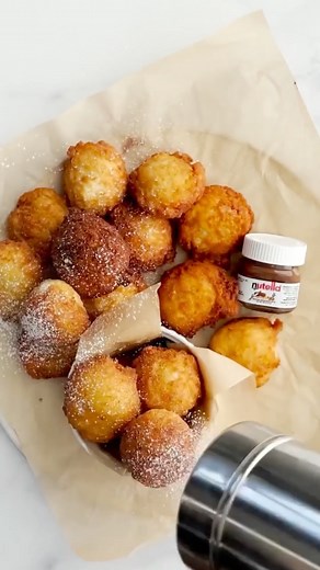 2.6K views · 54 reactions | Whether or not you’re celebrating Fat Thursday, these Zeppole (aka Italian Mini Donuts made with Krusteaz pancake mix) are a deliciously easy way to satisfy your sweet tooth! #KrusteazXNutella | Krusteaz | Facebook