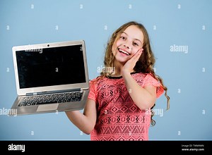 Work hard play harder. happy small girl with notebook. home schooling education. child development in digital age. video call by web cam. shopping online. school project. business video conferencing Stock Photo - Alamy