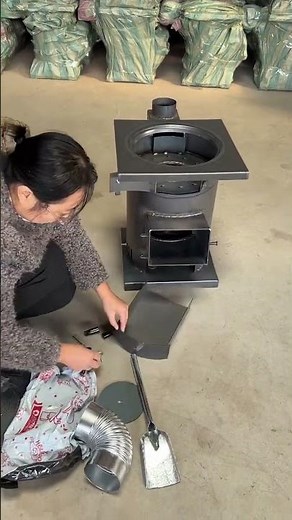 Smokeless gasification stove for both heating and cooking, using firewood and coal simultaneously.
