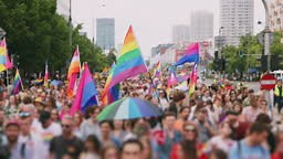 LGBTQIA  pride parade. Gay transgender and non-binary people proudly...