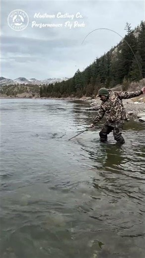 Netting a Rainbow Caught on a Craig Fly Rod