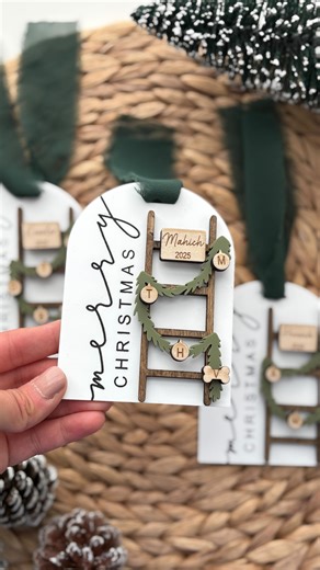 Jacks Crafts on Instagram: "A little behind the scenes on how these beautiful ornaments are made. Each one takes time to design, cut, paint, assemble, and package with care. . . . #ChristmasOrnaments #HolidayDecor #OrnamentMaking #CustomOrnaments #PersonalizedOrnaments #HolidayGiftIdeas #ChristmasGifts #omtech #lasermade #glowforge #holidaygift #familyornament #christmas2025"