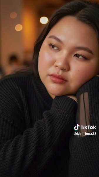 Gemini prompt: “Create A candid extreme close-up of a plus-size woman, use my uploaded photo as face and hair reference. She wears an oversized black knit sweater with sheer sleeves. Her eyes are half-closed, as if caught mid-thought. The camera is so close that part of her face is out of focus, leaving only one eye and cheek sharp while the rest blurs. Her skin shows freckles, natural shine, and faint imperfections under dim café lighting.” #gemini #CapCut #aiprompt #makeitvirаl #trending