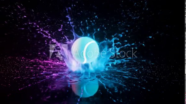 Colorful Splash and Droplet Effects - This video captures a vibrant splash of water colored in shades of blue and purple, created by a droplet falling from a glowing ball above.