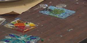 Making handmade ornaments out of cut glass for the holidays