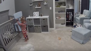 'You can do it!': Nursery cam catches toddler helping baby brother escape crib