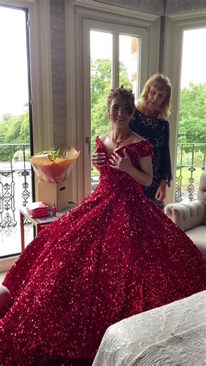 Bride in Red Wedding Dress Sparkles on Her Big Day