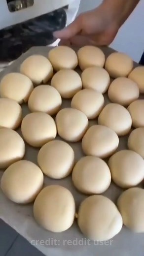 Introducing the revolutionary Dough Ball Rolling Machine - the perfect addition to any bakery or pizza shop! This innovative machine is designed to efficiently roll dough into perfectly shaped balls, saving bakers valuable time and effort. With its advanced technology and durable construction, the Dough Ball Rolling Machine is capable of handling large quantities of dough with ease. Simply place the dough in the machine, and within seconds, it will be expertly rolled into a perfect ball every ti