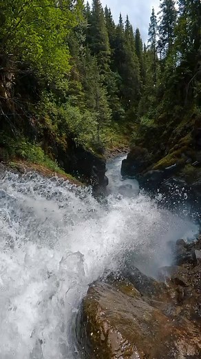 Water tumbling over a 60 foot waterfall in south central alaska! It’s so warm out here rn 🙌🏼☀️ #alaska #waterfall #art #nature | John Derting