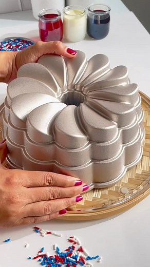 1.4K views · 14 reactions | Quick and easy last-minute 4th of July cake ideas! Here's our red, white, and blue Jell-O cake made with our Petal Fluted Pan for some inspo❤️懶 ⁠ Now on special sale, we're offering $5 OFF on all our Fluted Cast Aluminum Collection, when you spend over $20. Grab yours now just in time for Independence Day! ⁠ ⁠ Enter Code "5OFFJUL4" at checkout on the bakerssecret.com/collections/premium-bakeware-4th-of-july-2024?page=1 | Baker's Secret | Facebook