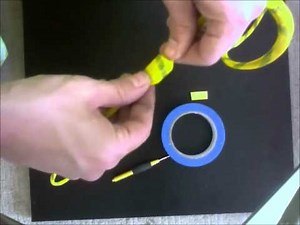 Cable wrapping the Sennheiser HD25-1