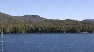 Inside passage Alaska ship pine forest. The Inside Passage a coastal route for ships and boats. Network of natural island channels weave through the Pacific Northwest coast of the North America