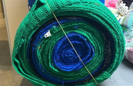 Knitters Donate Bales of Scarves to KLC's Joseph Jersey Project