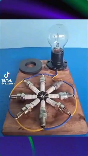 More easy free energy to light your way. No hidden battery (The bulb is an alternating current bulb anyways....just proving a point) as the circuit is completed before he put the spark plugs in the magnetic field. All electromagnetic energy is 220v unless stepped down to 110v. Make sure your socket and bulb are 220v rated.#FreeEnergy#ElectromagneticEnergy