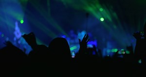 People Listening to the Musical Band on the Concert