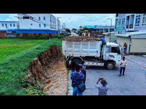 Excellent bulldozer driver push soil and filling up land