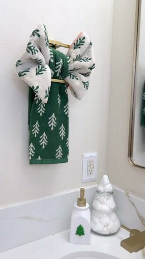 28K views · 85 reactions | Amazon Holiday Bathroom Finds! COMMENT “SO CUTE” to receive a DM. The seasonal holiday soap dispenser is a game changer! It comes with 7 magnetic attachments for each holiday seasons. Also how easy it is to make a bow with towels to decorate your bathroom or kitchen for this holidays  #amazonhome #christmasdecor #bathroomdecor #howto #amazondeco | Elnaz Hamai Home Hacks | Facebook