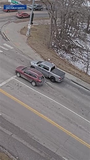 Video from police in Nebraska shows the moment two vehicles fell into a sinkhole after the road collapsed. No one was injured. See it here: http://www.kcci.com/article/video-nebraska-sinkhole/70493062 | KCCI