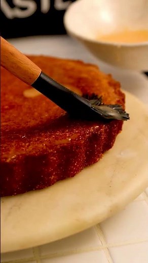 ClemenGold® polenta cake with dark chocolate ganache recipe | Woolworths TASTE