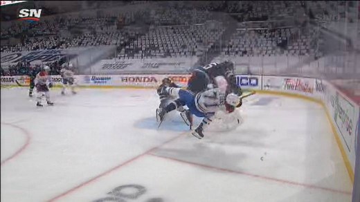 Montreal Canadiens’ Jake Evans stretchered off the ice after hard hit from Jets’ Mark Scheifele