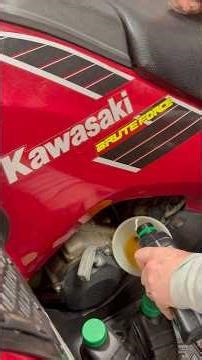 First oil change on my ’05 Kawasaki Brute Force 750—20 years strong, clean oil, no metal found.
