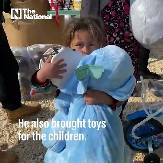 Turkish celebrity chef Burak Ozdemir cooks for refugees in Syria's Idlib