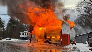 Crews battle garage fire in Windsor County