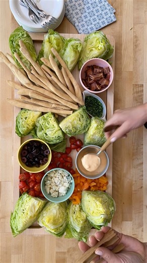 15K views · 823 reactions | Easter Wedge Salad Board! We love this wedge salad board with your favorite toppings! ❤️ ENJOY! Tap the recipe link in bio https://reluctantentertainer.com/easter-wedge-salad-board/ ❤️ #reluctantentertainer #wedgesalad #saladboard #easter2024 #saladsofinstagram #saladreels #wedge #eastersalad | Reluctant Entertainer | Facebook