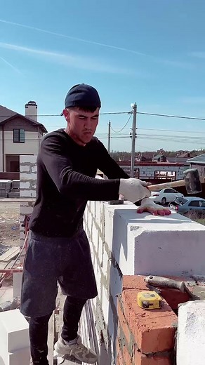 Bricklaying Techniques by Experienced Construction Worker
